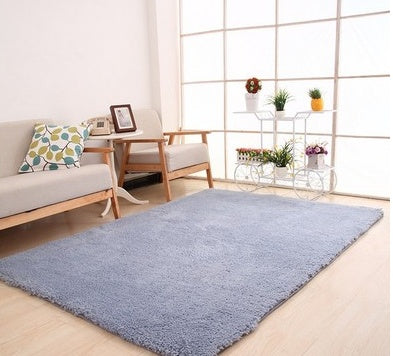 Effortlessly chic and sleek, this fluffy white rug transforms your floor into a serene statement piece. Instantly softens the aesthetic of hardwood or tile, making spaces feel more inviting, calm, and fashion-forward.